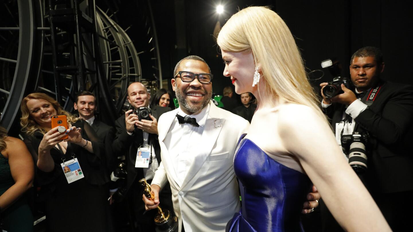 Jordan Peele and Nicole Kidman backstage at the 90th Academy Awards on Sunday at the Dolby Theatre in Hollywood.