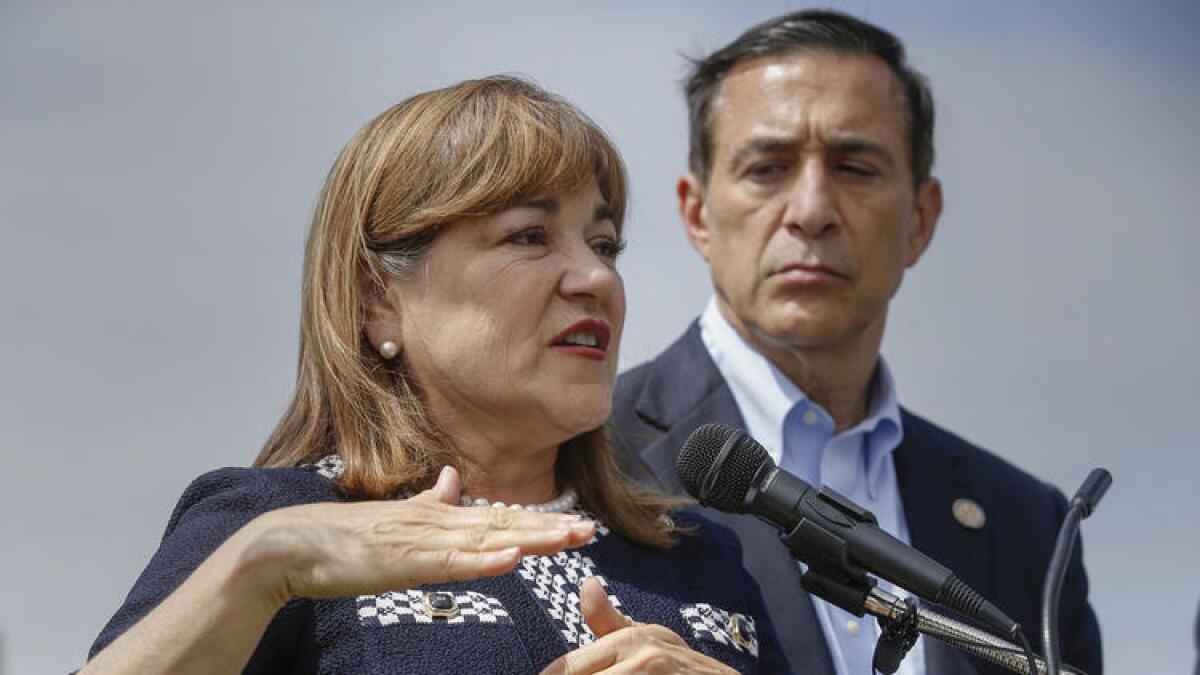 U.S. Reps. Loretta Sanchez (D-Orange) and Darrell Issa (R-Vista) participate in a bipartisan congressional fact-finding tour of several military bases and defense-industry businesses this month.