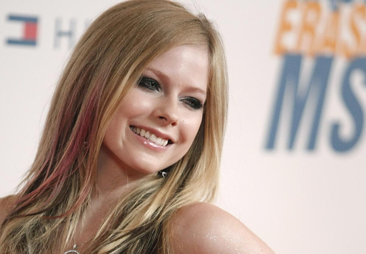 Avril Lavigne asks fans for prayers as she struggles with undisclosed "health issues."