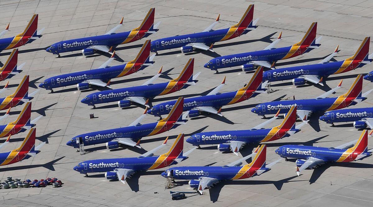 Boeing 737 Max planes have been grounded since March. Above, some of those planes, prepared for Southwest Airlines, sit at the Southern California Logistics Airport in Victorville.