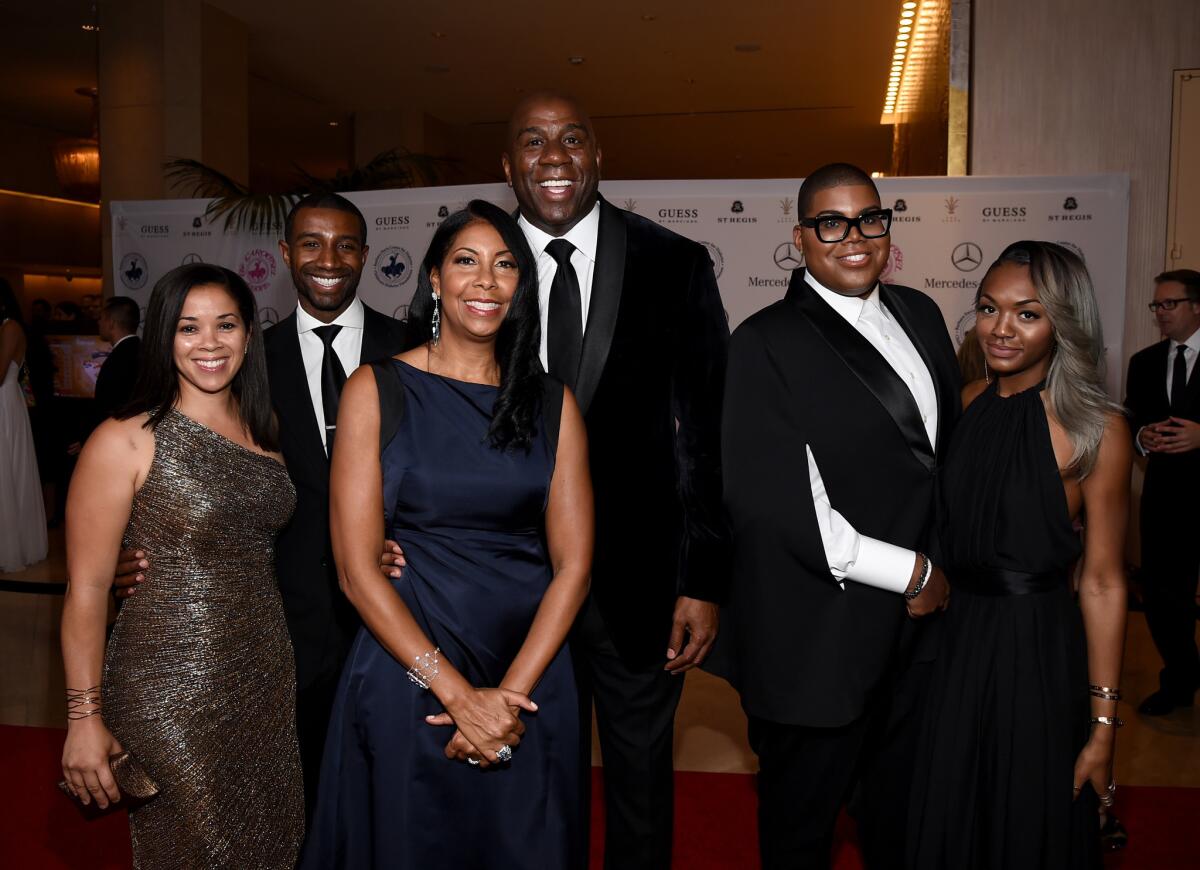 Among those attending the 2014 Carousel of Hope Ball in Beverly Hills on Saturday were, from left, Lisa Johnson, Andre Johnson, Cookie Johnson, Earvin "Magic" Johnson, EJ Johnson and Elisa Johnson. The former NBA superstar received an honor at the event.
