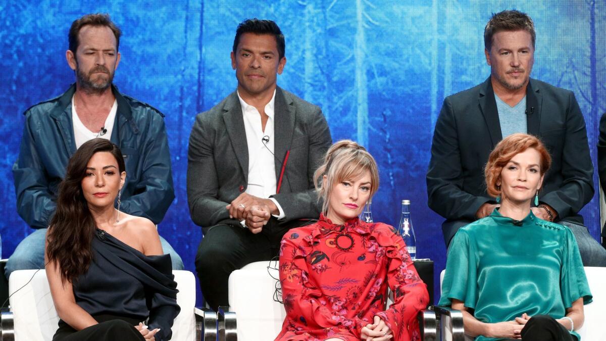 Gathered for the "Riverdale" presentation at the Television Critics Assn. summer press tour are, top row from left, Luke Perry, Mark Consuelos and Lochlyn Munro and, bottom row from left, Marisol Nichols, Mädchen Amick and Nathalie Boltt.
