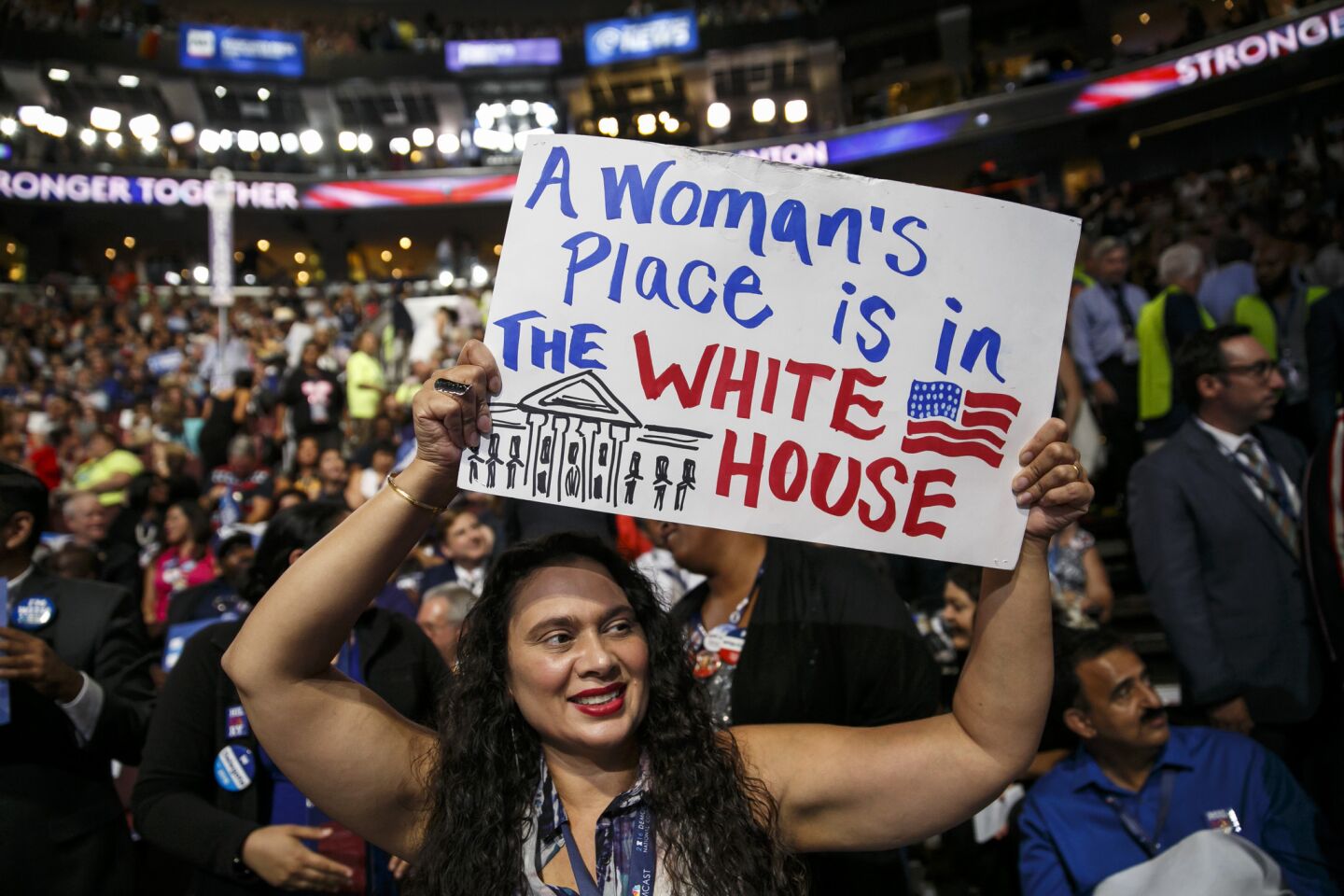 California delegate holds up at sign that reads, "A Woman's Place Is In The White House," at the 2016 Democratic National Convention in Philadelphia.