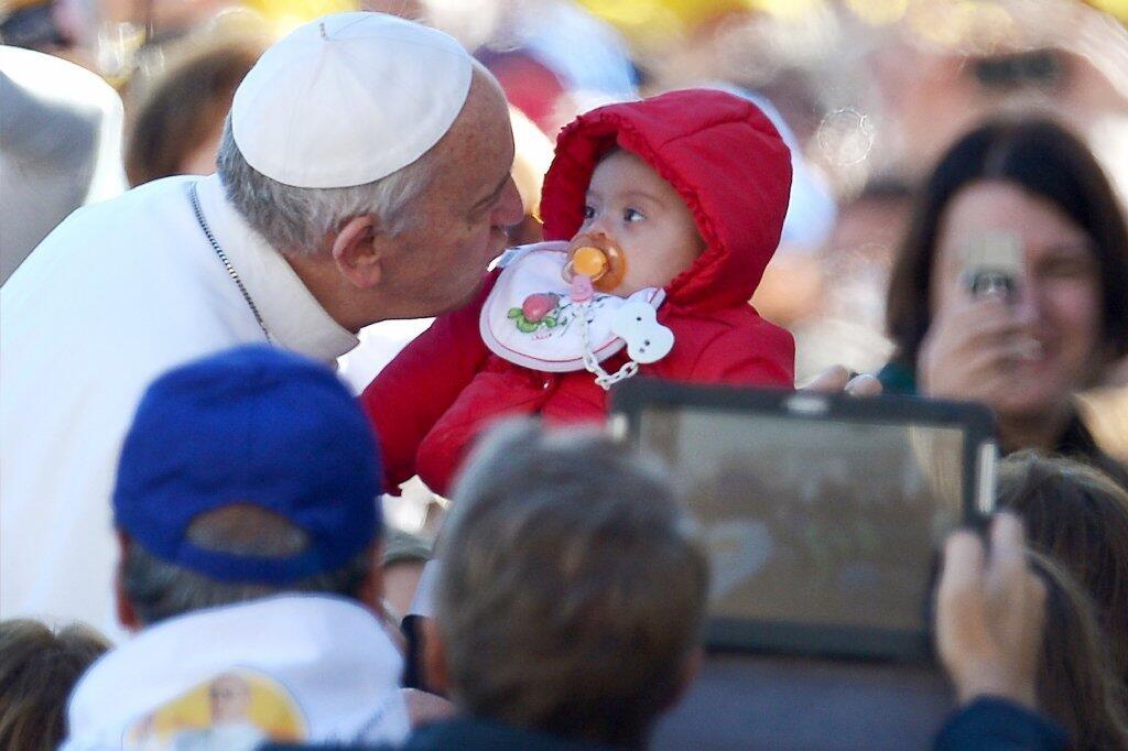 Pope goes in for the kiss