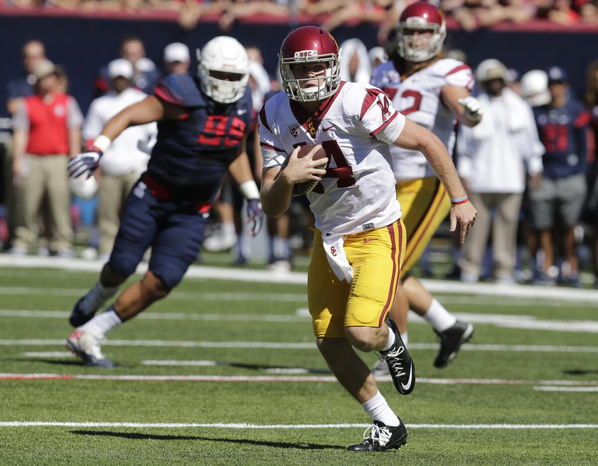 USC quarterback Sam Darnold scrambles for yardage during the first half of the game against Arizona on Oct. 15.