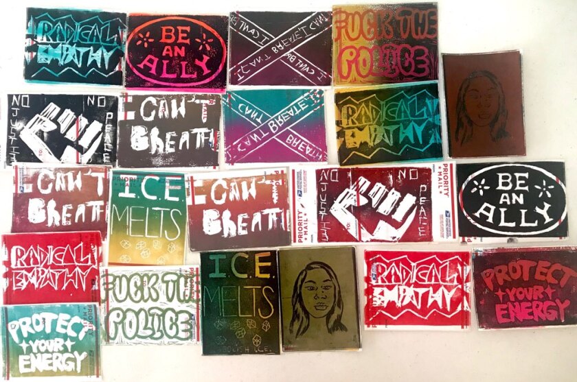 Protest art created at Hill Street Country Club's printmaking workshop.