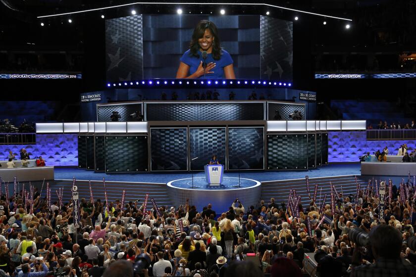 Michelle Obama, onstage at the Democratic National Convention in Philadelphia, before the basket-weave design that has become a theme of the political gathering.