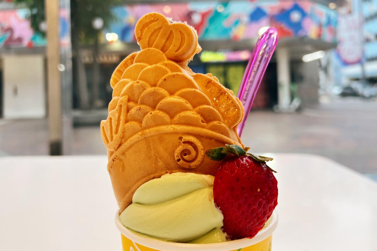 Matcha soft serve with a fish-shaped waffle at SomiSomi in Little Tokyo.