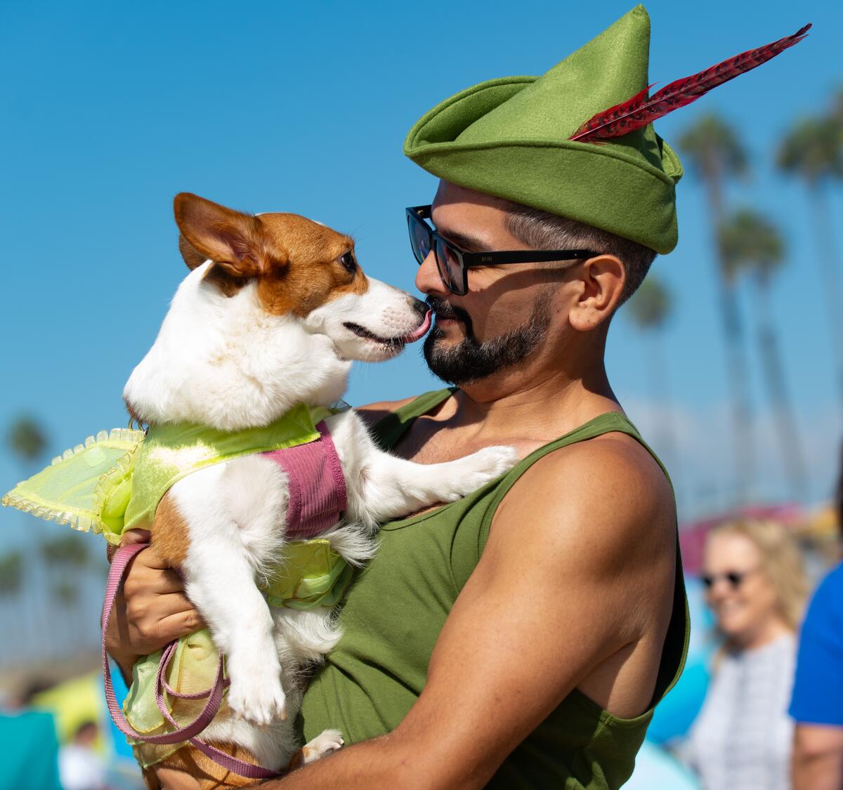 Molly and owner Alfonso Ortega, dressed as Disney's Peter Pan and Wendy.