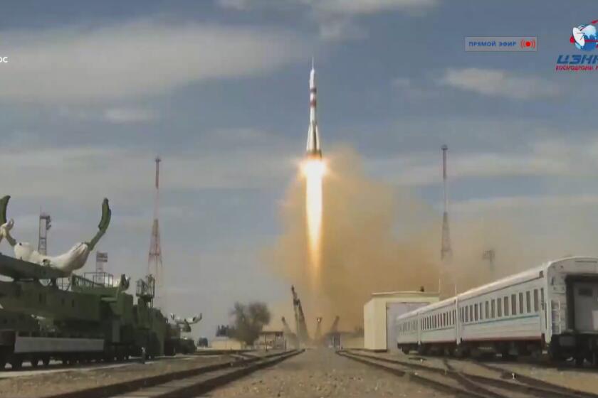 In this grab taken from video footage released by Roscosmos Space Agency, the Soyuz-2.1a rocket booster with Soyuz MS-16 space ship carrying a new crew to the International Space Station, ISS, blasts off at the Russian leased Baikonur cosmodrome, Kazakhstan, Thursday, April 9, 2020. The Russian rocket carries U.S. astronaut Chris Cassidy, Russian cosmonauts Anatoly Ivanishin and Ivan Vagner. (Roscosmos Space Agency via AP)