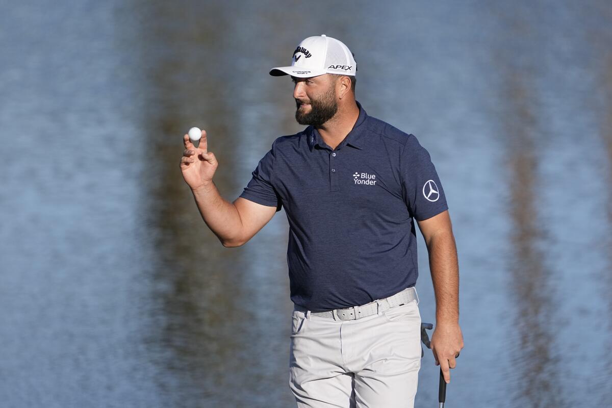 Jon Rahm acknowledges the gallery after finishing his round at the American Express golf tournament Jan. 20, 2023.