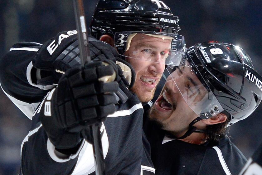 Kings forward Jeff Carter (77) celebrates his goal against the Blue Jackets with defenseman Drew Doughty in the second period Sunday at Staples Center.