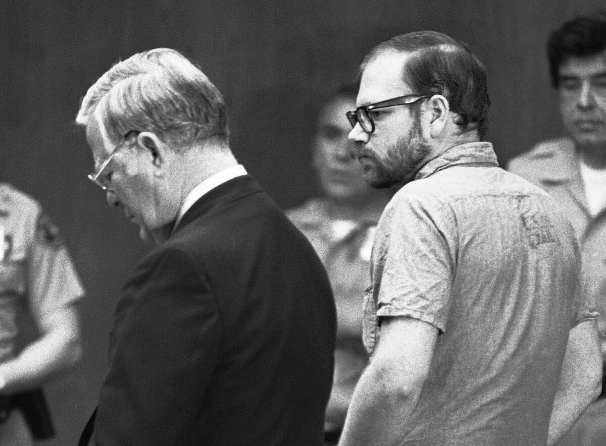 Roy Lewis Norris listens as charges are read against him in court in March 1980 in the rape-torture deaths of five teenage girls. Norris pleaded guilty to five counts of murder in a deal to avoid the death penalty.