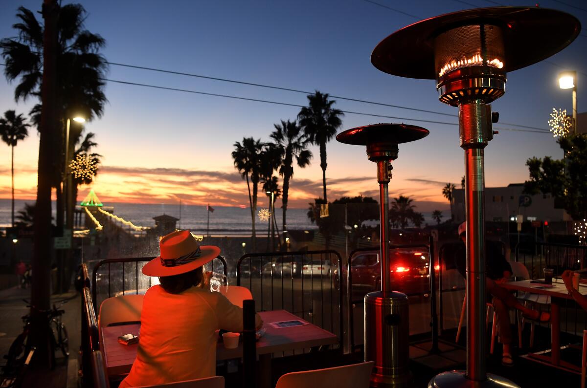 Customers dined along Manhattan Beach Boulevard before the shutdown in December.