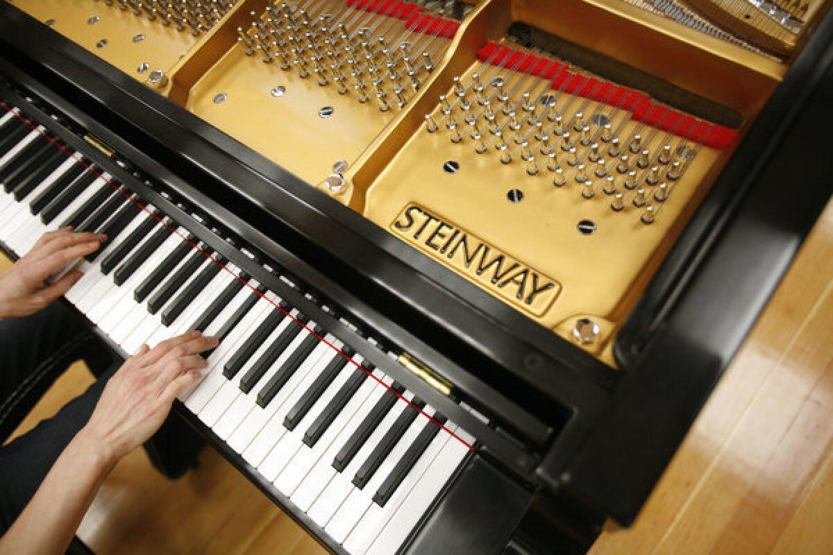 Steinway is in the midst of a bidding war between two financial firms.