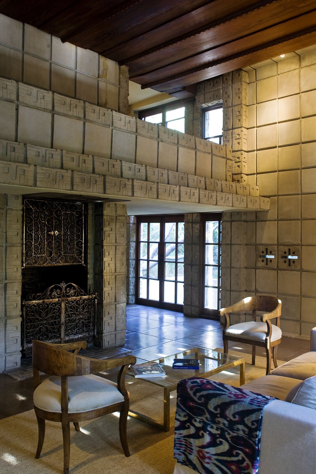 Mezzanine and fireplace inside "La Miniatura." (Ricardo DeAratanha / Los Angeles Times)