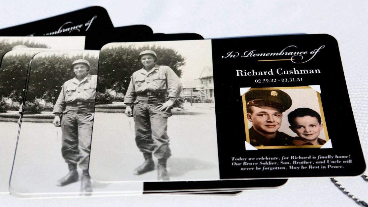 A remembrance card for Army Sgt. 1st Class Richard G. Cushman was displayed during his funeral service at Forest Lawn Memorial Park in Cypress on Feb. 3.
