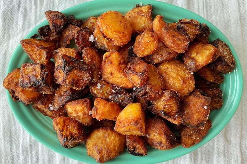 English roast potatoes are boiled then shallow-fried in the oven until burnished and exceedingly crunchy.