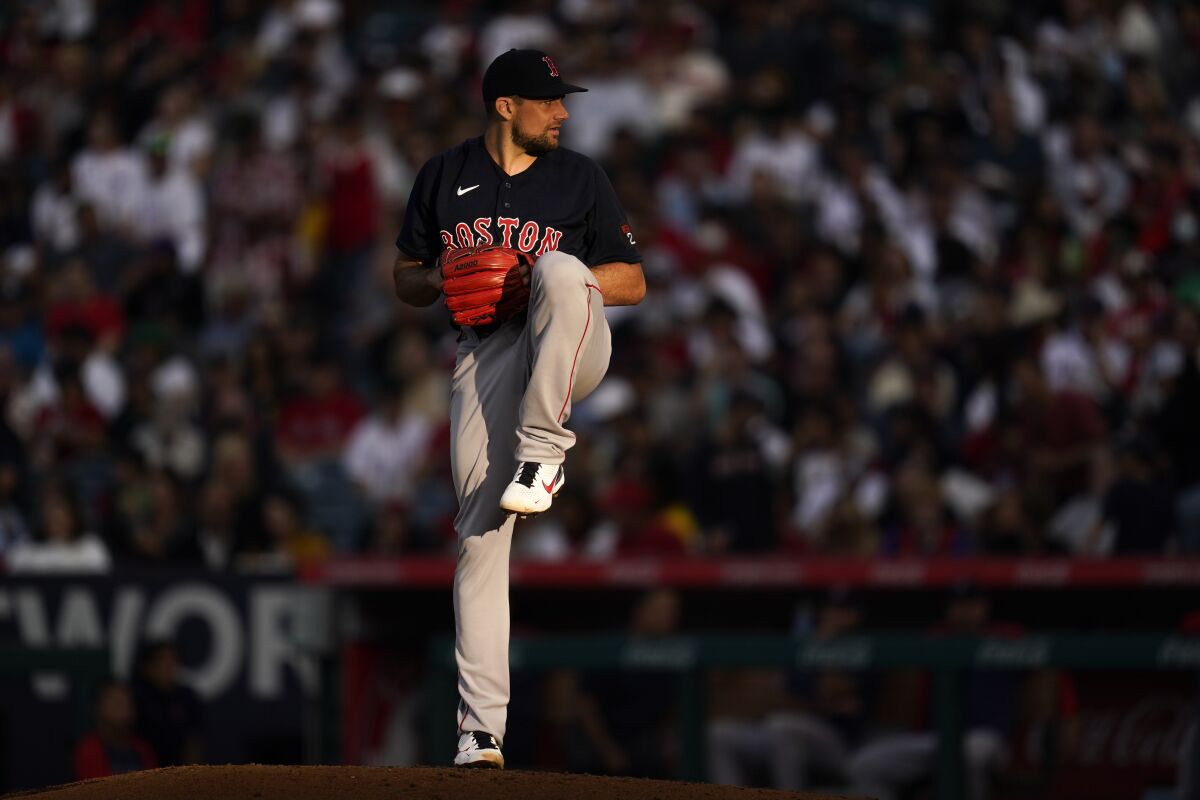 Boston Red Sox starting pitcher Nathan Eovaldi (17) throws during the second inning of a baseball game against the Los Angeles Angels in Anaheim, Calif., Wednesday, June 8, 2022. (AP Photo/Ashley Landis)