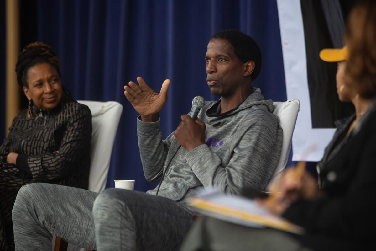 MLK Day Volunteer Event in Westchester Retired LA Laker, AC Green, talks during a panel discussion during the day of service at Orville Wright STEAM Magnet Middle School on Monday.