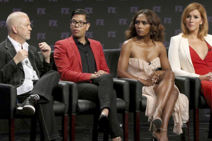 Ryan Murphy, co-creator/executive producer/writer/director, from left, Steven Canals, co-creator/co-executive producer/writer, producer/writer/director Janet Mock and producer/writer Our Lady J participate in a panel for "Pose" during the FX Television Critics Association Summer Press Tour at The Beverly Hilton hotel on Friday, Aug. 3, 2018, in Beverly Hills, Calif. (Photo by Willy Sanjuan/Invision/AP)