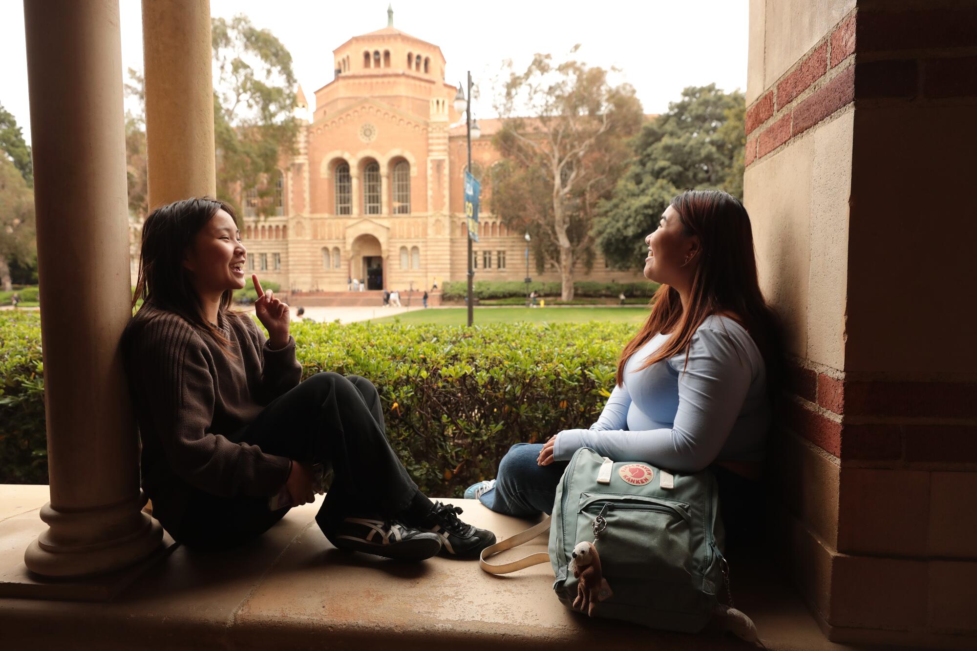First year students relax together between classes at the arches of Royce Hall on the UCLA campus on May 5.