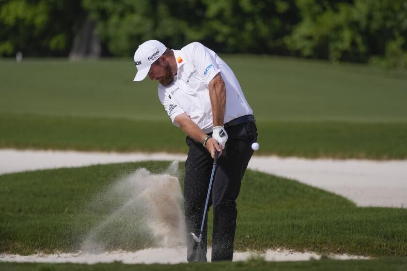 Shane Lowry, of Ireland, hits out of the sand on the 15th fairway during the final round of the PGA Zurich Classic golf tournament at TPC Louisiana in Avondale, La., Sunday, April 28, 2024. (AP Photo/Gerald Herbert)