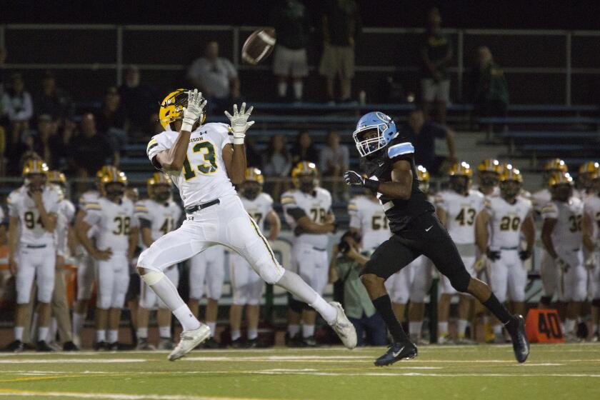 Edison's Cole Koffler completes a long pass and runs the ball for a touchdown against Carson during a non-league game on Thursday, August 29, 2019. ///ADDITIONAL INFO: tn-dpt-sp-hb-edison-football-carson-20190829 7PM 08/29/19 - Photo by DREW A. KELLEY, CONTRIBUTING PHOTOGRAPHER