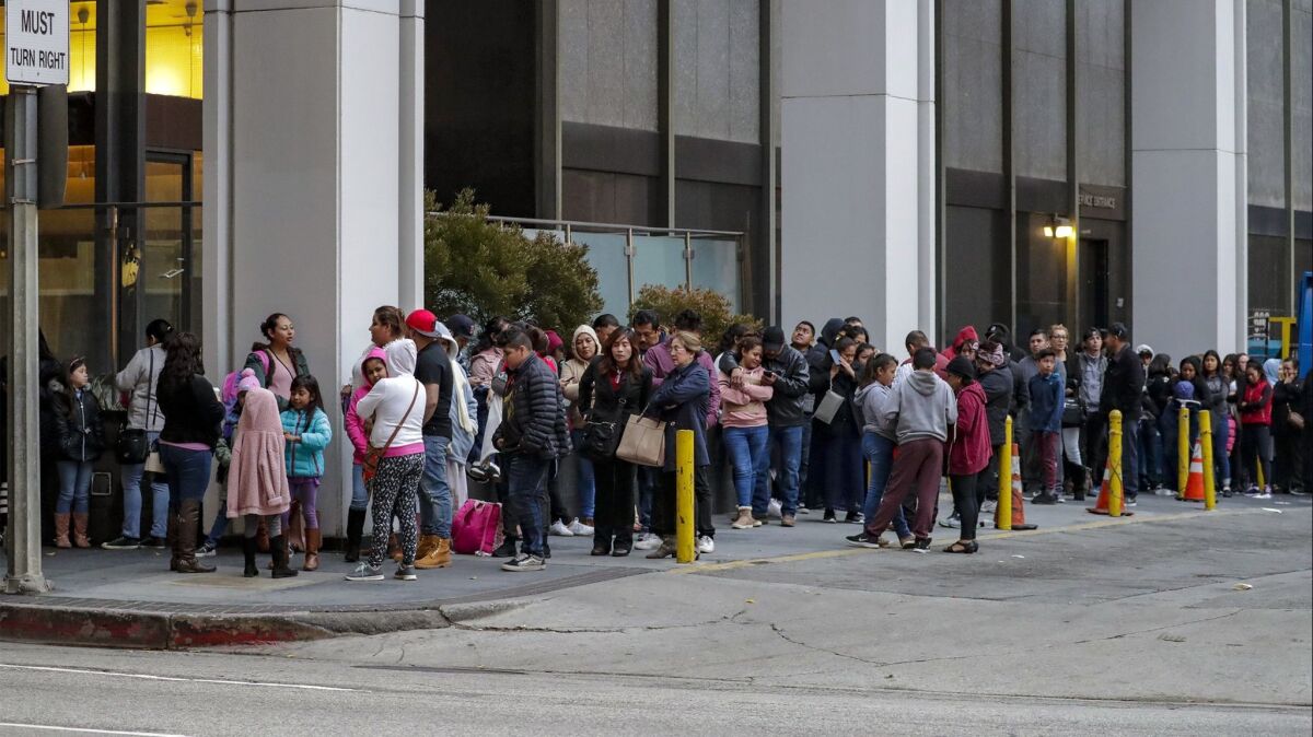 Hundreds of immigrants lined up outside Immigration Court in L.A. Jan. 31 after receiving notices to appear from the Department of Homeland Security, though they didn't actually have scheduled hearings. Officials blamed the recent government shutdown.