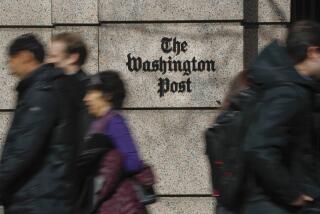 FILE - People walk by the One Franklin Square Building, home of The Washington Post newspaper, in downtown Washington, Feb. 21, 2019. New leaders of The Washington Post are being haunted by their past, with ethical questions raised about their actions as journalists in London that illustrate very different press traditions in the United States and England. (AP Photo/Pablo Martinez Monsivais, File)