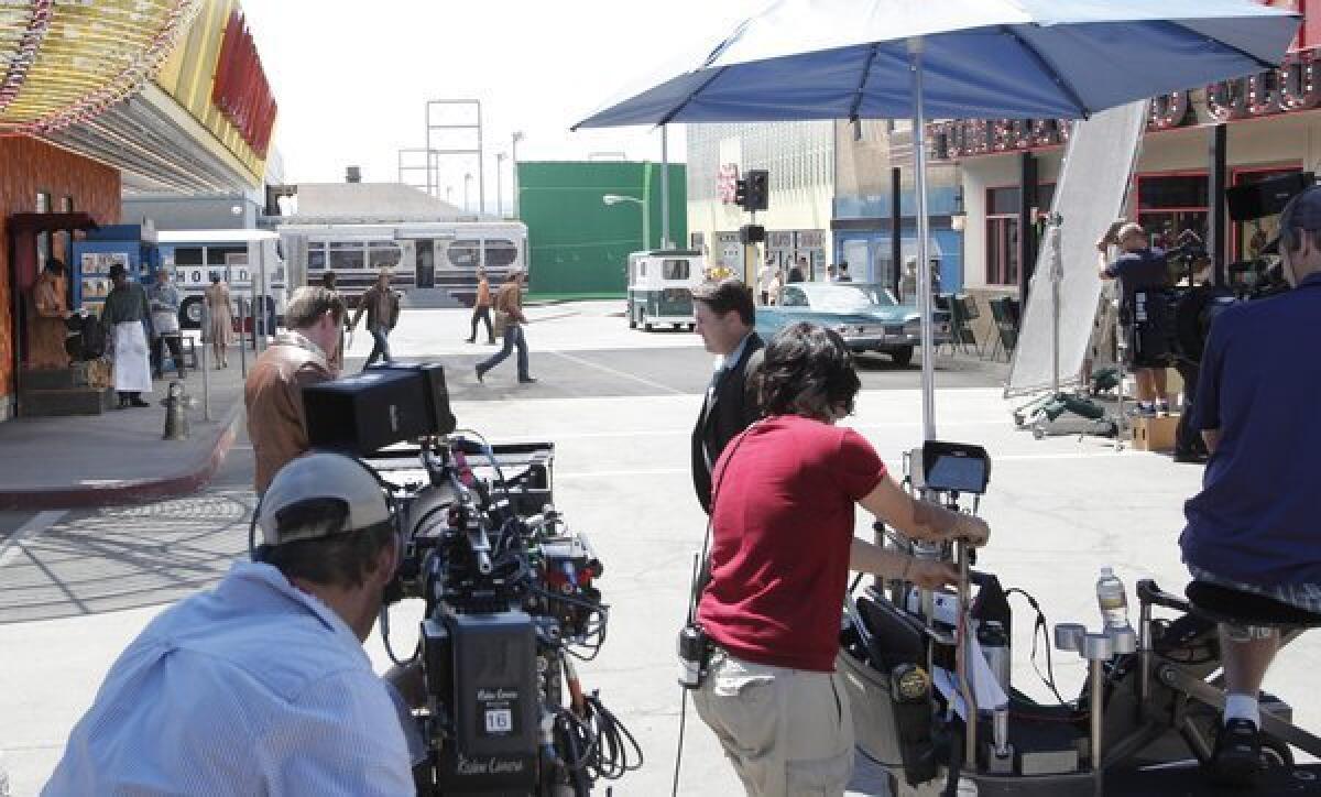 A crew films a scene for CBS TV show "Vegas," which is re¿creating the Vegas strip of the 1960s in a studio in Santa Clarita Studios.