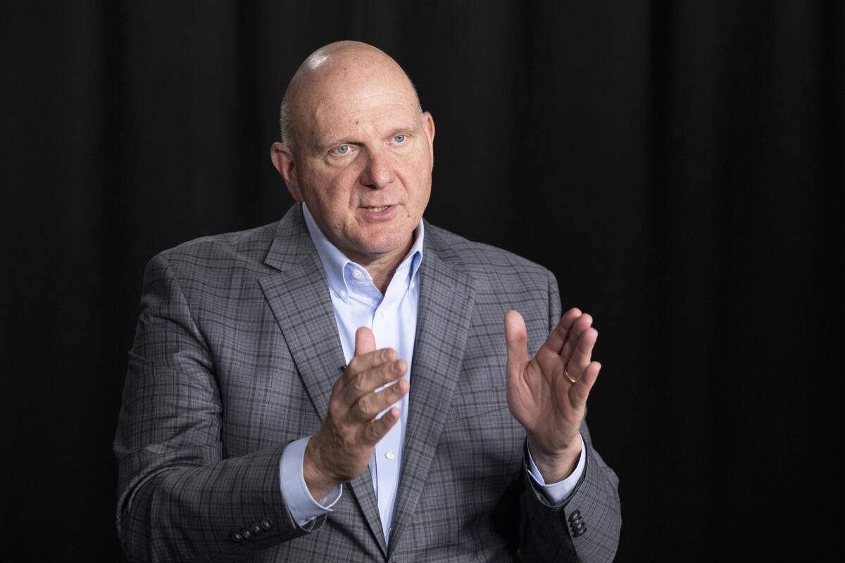 In this Nov. 14, 2019, photo, Clippers owner Steve Ballmer, founder of USA Facts, talks during an interview in New York.