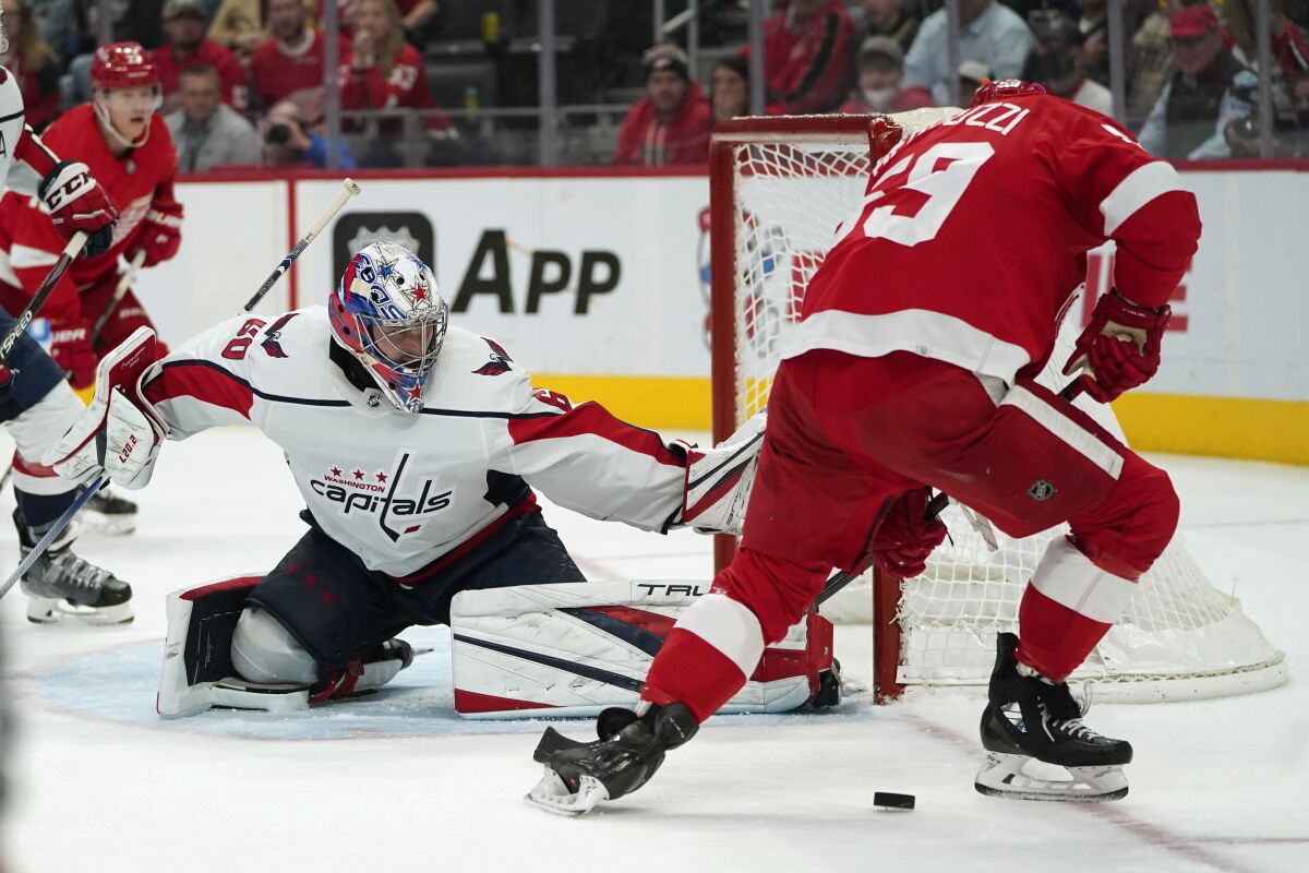 Washington Capitals goalie Zach Fucale stops a Detroit Red Wings left wing Tyler Bertuzzi (59) shot in the second period of an NHL hockey game Thursday, Nov. 11, 2021, in Detroit. (AP Photo/Paul Sancya)