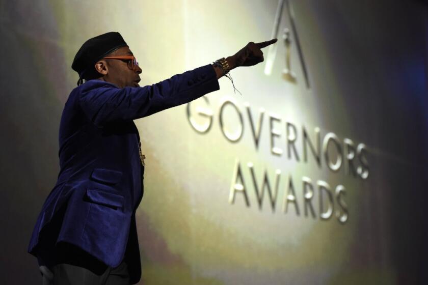 Spike Lee, honorary Oscar recipient, gestures onstage at the Governors Awards.