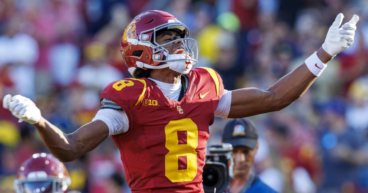 Commentary: USC proves it's a playoff contender in Coliseum-reviving beat down of Michigan