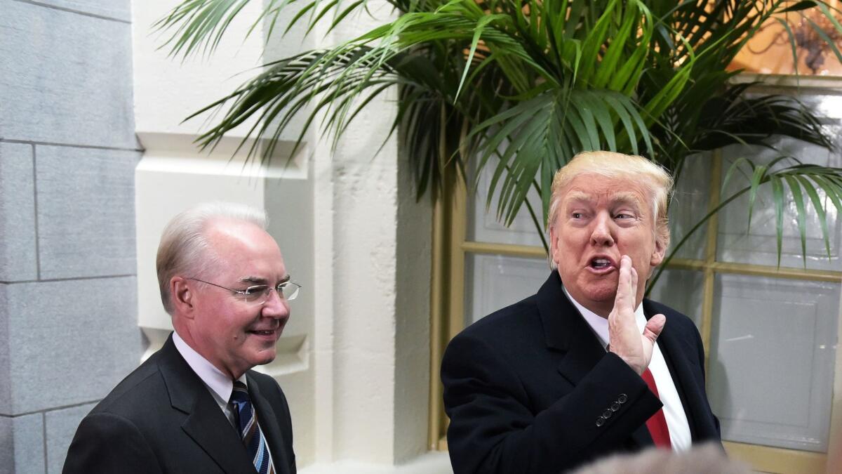 Health and Human Services Secretary Tom Price, left, and President Donald Trump met with Republicans at the Capitol on Tuesday.