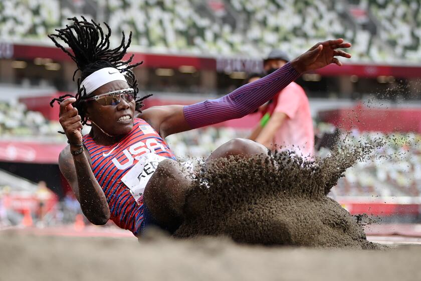 TOKYO, JAPAN - AUGUST 03: Brittney Reese of Team United States competes in the Women's Long Jump Final on day eleven of the Tokyo 2020 Olympic Games at Olympic Stadium on August 03, 2021 in Tokyo, Japan. (Photo by Matthias Hangst/Getty Images)