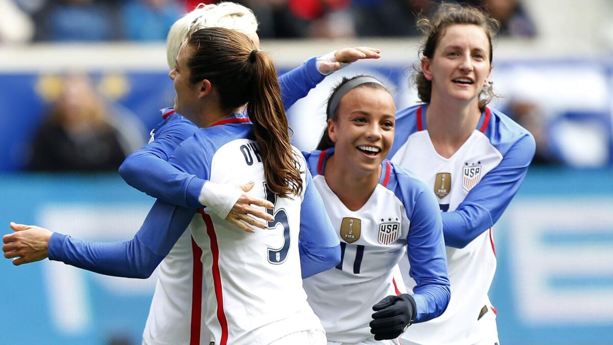 American forward Mallory Pugh (11) celebrates with teammates after scoring against France during a SheBelieves Cup women's soccer match on March 4, 2018, in Harrison, N.J.
