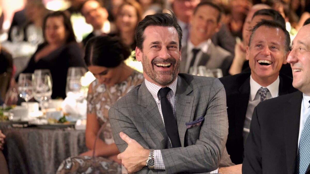 Jon Hamm shares a laugh with the crowd at the Hollywood Reporter's annual Hollywood breakfast of industry power players.