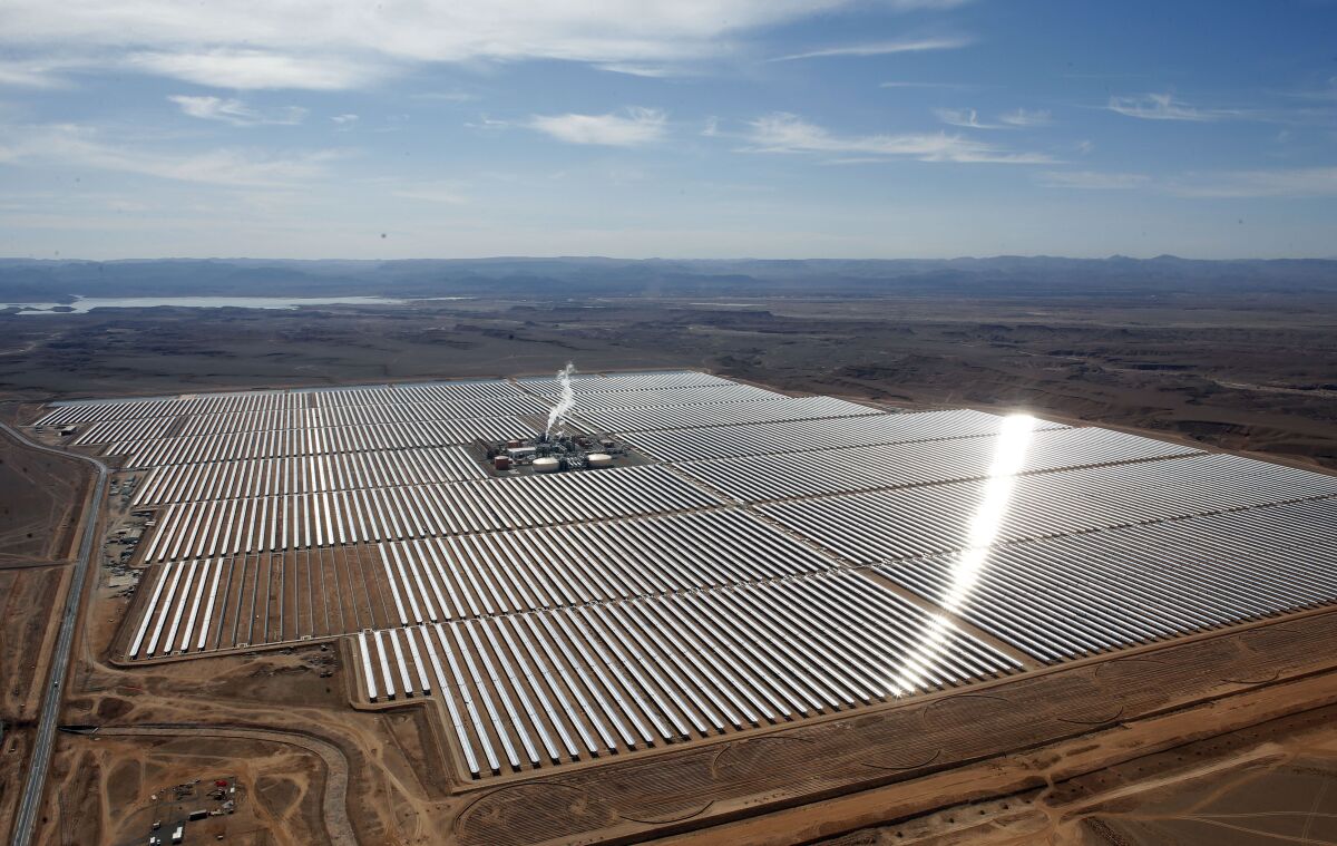 FILE - An aerial view of a solar power plant in Ouarzazate, central Morocco on Feb.4, 2016. Renewable energy's potential across the African continent remains largely untapped, according to a new report in April 2022 by the United Nation's Intergovernmental Panel on Climate Change. (AP Photo/Abdeljalil Bounhar, File)