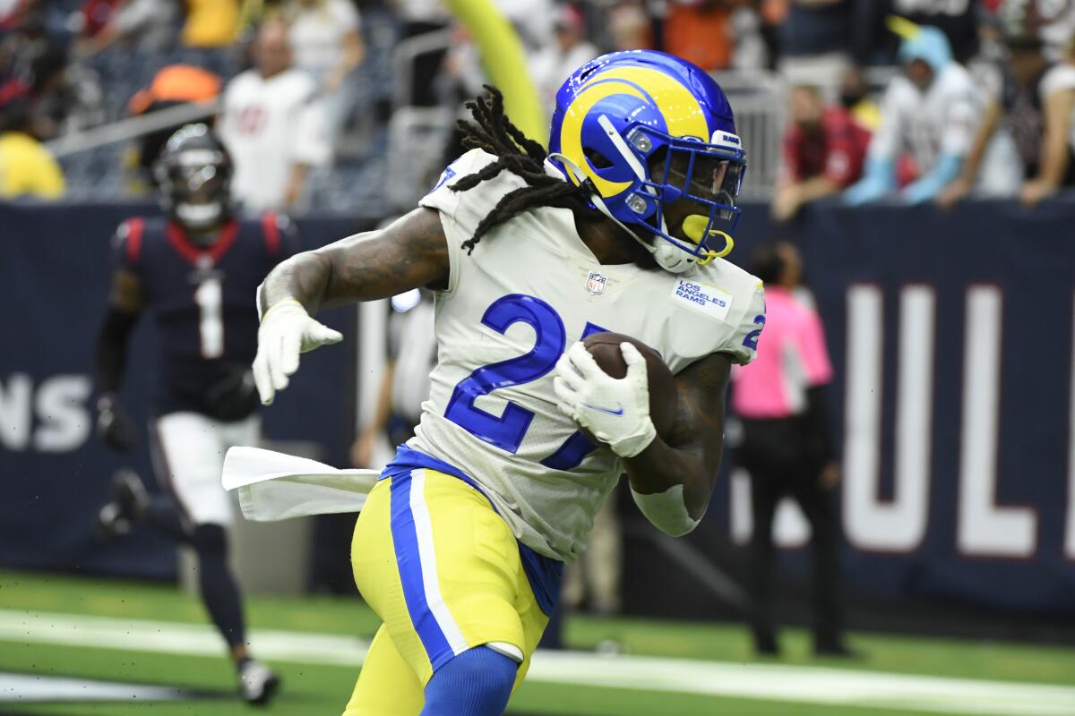 Rams running back Darrell Henderson scores a touchdown against the Houston Texans.