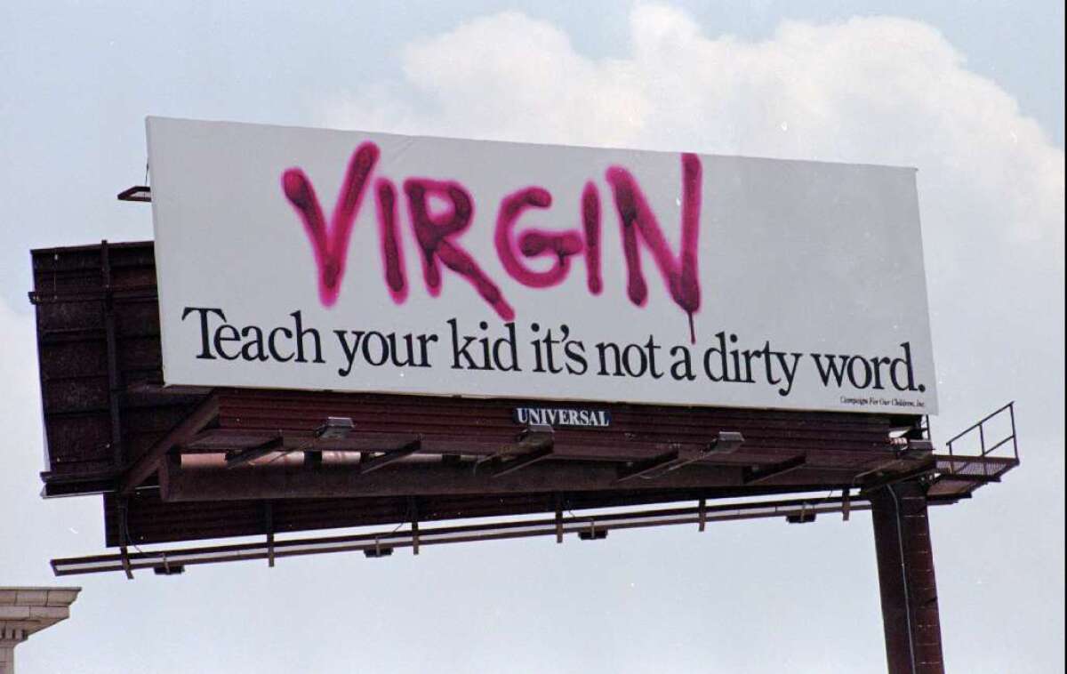 Billboards like this and other measures to promote abstinence and contraception have helped bring the U.S. teen birthrate to a historic low, a new report says.
