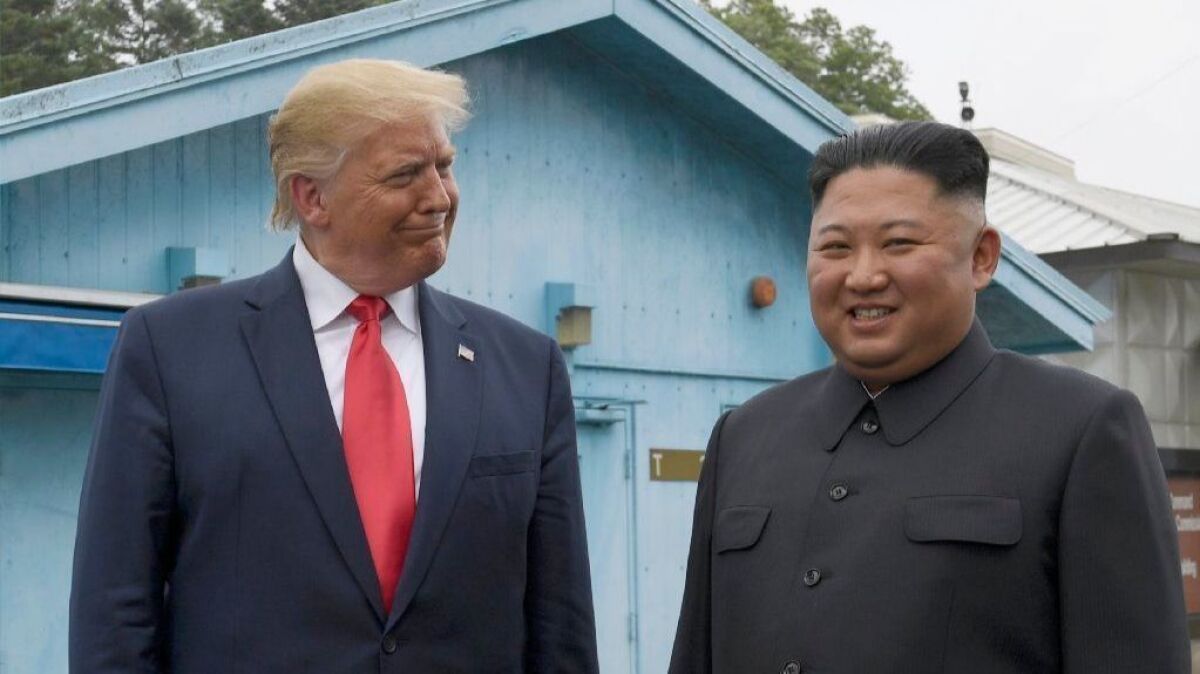 President Trump and North Korean leader Kim Jong Un in the demilitarized zone Sunday.