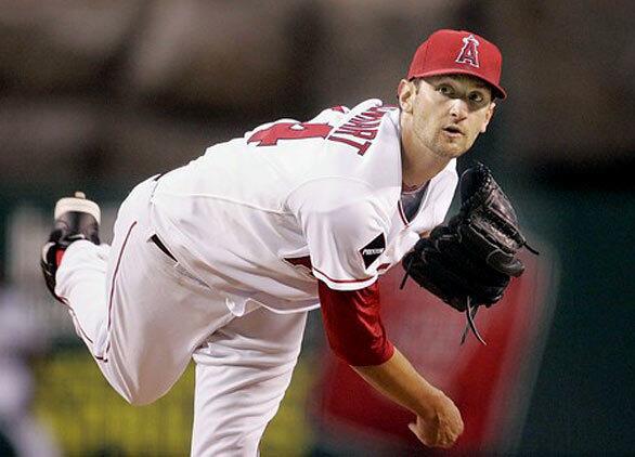 Nick Adenhart delivers a pitch during Wednesday night's game against Oakland Athletics in Anaheim. Adenhart was among the three people killed in a hit-and-run accident in Fullerton. The crash occurred hours after the 22-year-old appeared in Wednesday night's Angels game. RELATED Angels pitcher Nick Adenhart killed in car crash Angels have a long history of tragedies