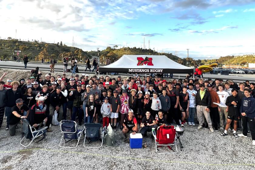 The Mustang Rugby tailgate group at Snapdragon Stadium.