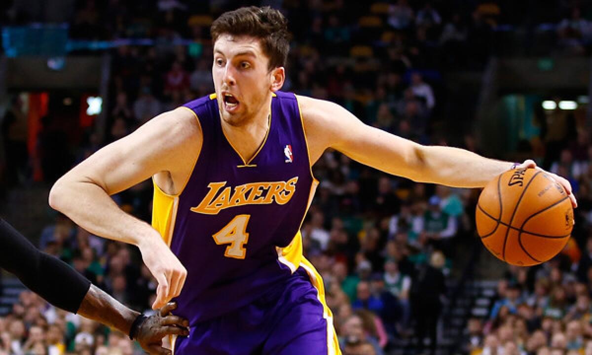 Lakers forward Ryan Kelly drives to the basket during the team's 107-104 win over the Boston Celtics on Friday.