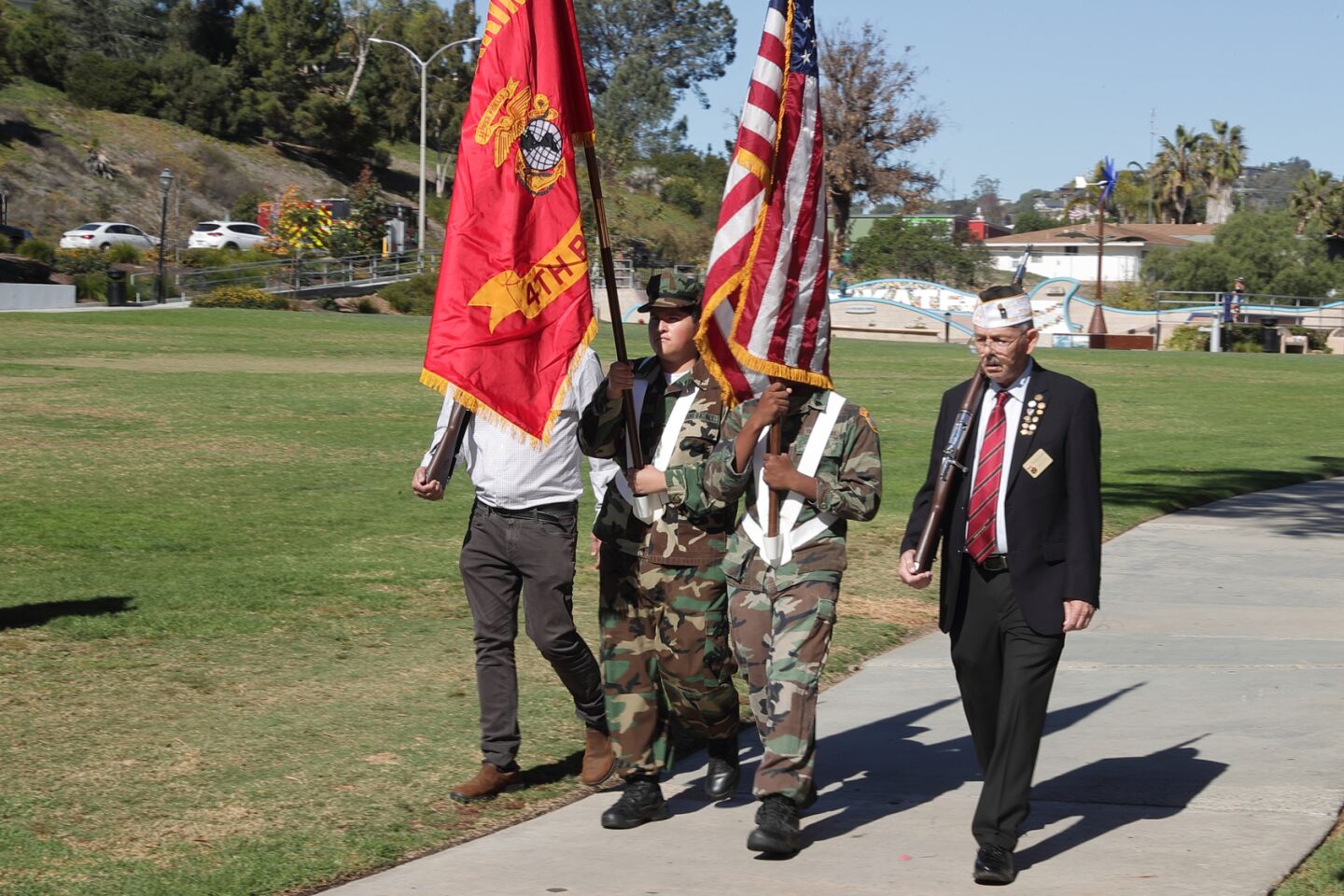 Rudy Saenz (far left) and Randy Treadway (far right) with the Camp Pendleton Young Marines color guard