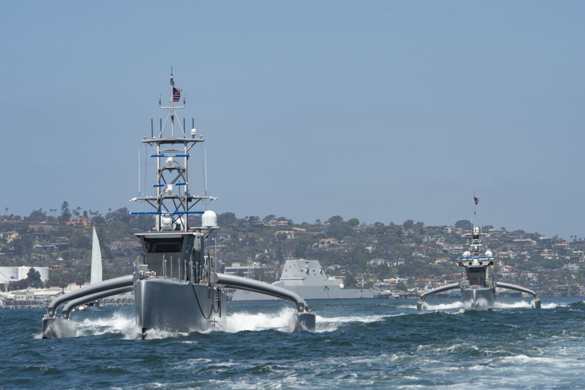Unmanned surface vessels Seahawk, front, and Sea Hunter and guided-missile destroyer Michael Monsoor