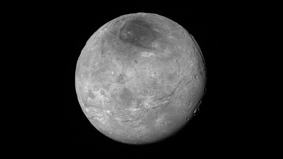 This image of Charon shows relatively smooth, fractured plains in the lower right; several enigmatic mountains surrounded by sunken terrain features on the right side; and heavily cratered regions in the center and upper left portion of the disk.