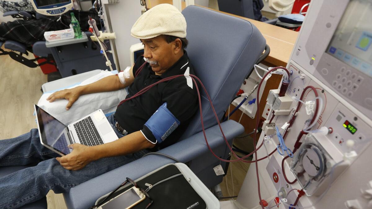 Adrian Perez undergoes dialysis at a DaVita Kidney Care clinic in Sacramento. If approved by voters in November, Proposition 8 would limit dialysis clinics' profits.